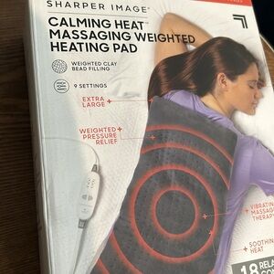 Calming Heat Massaging Weighted Heating Pad by Sharper Image